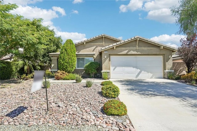 single story home featuring a garage