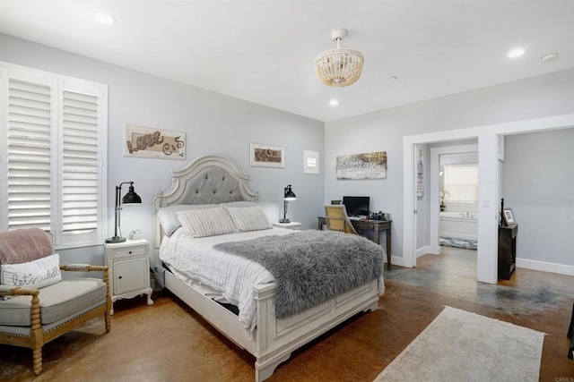 bedroom with connected bathroom, a notable chandelier, and multiple windows