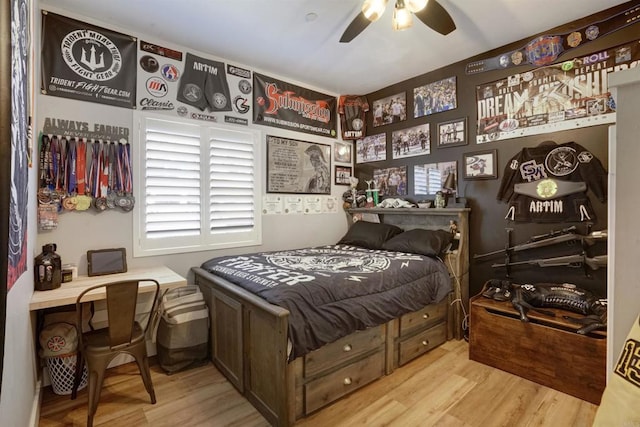 bedroom featuring ceiling fan and light wood-type flooring