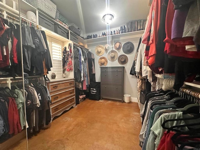 spacious closet featuring vaulted ceiling