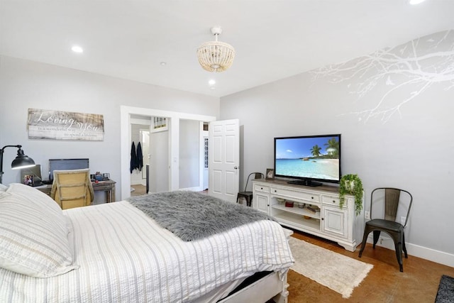 carpeted bedroom featuring a chandelier