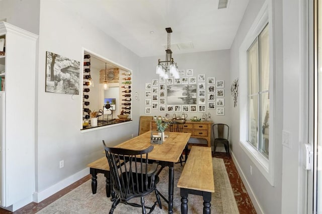 dining area with a chandelier