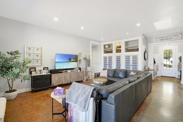 living room with a skylight