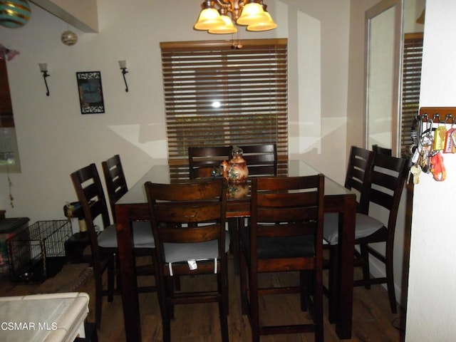 dining room with wood-type flooring