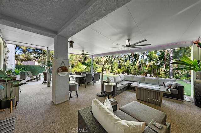 view of patio / terrace featuring an outdoor living space and ceiling fan