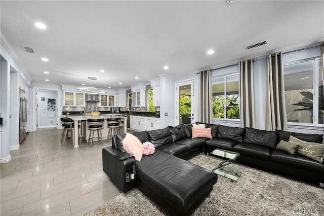 living room featuring ornamental molding