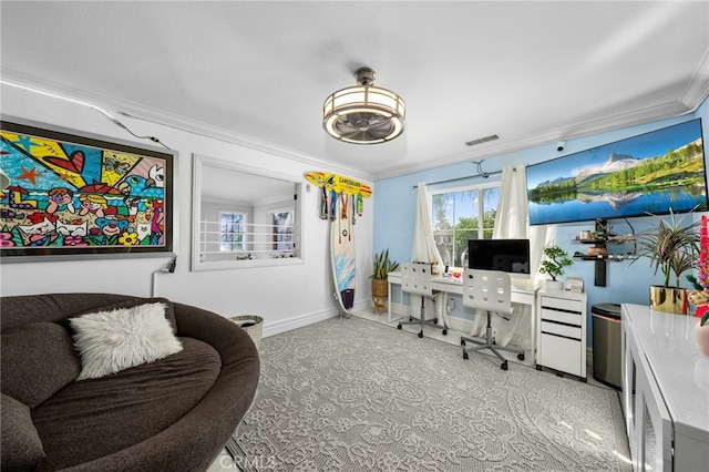 home office with ornamental molding and light carpet