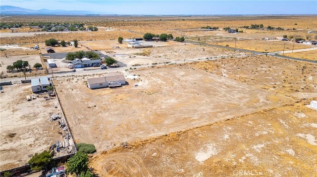 aerial view featuring a mountain view and a rural view