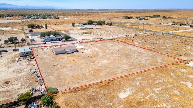 bird's eye view with a mountain view and a rural view