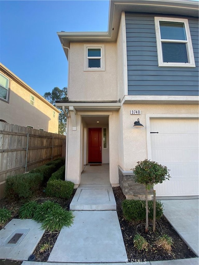 entrance to property featuring a garage