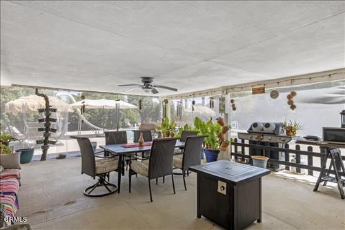 view of patio with ceiling fan