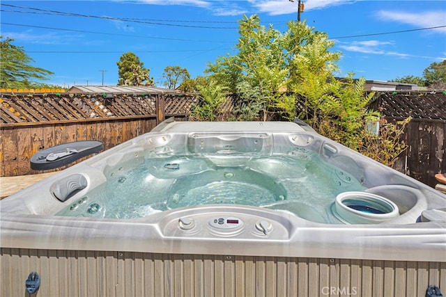 exterior details with a jacuzzi