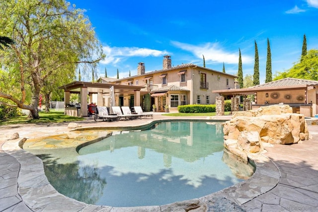 view of pool with a patio