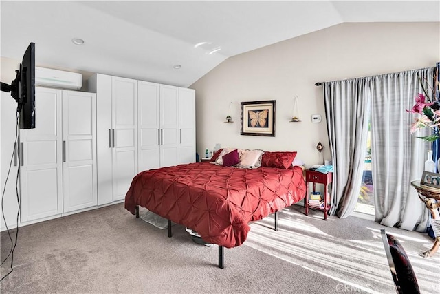 bedroom with a wall mounted air conditioner, light colored carpet, and vaulted ceiling