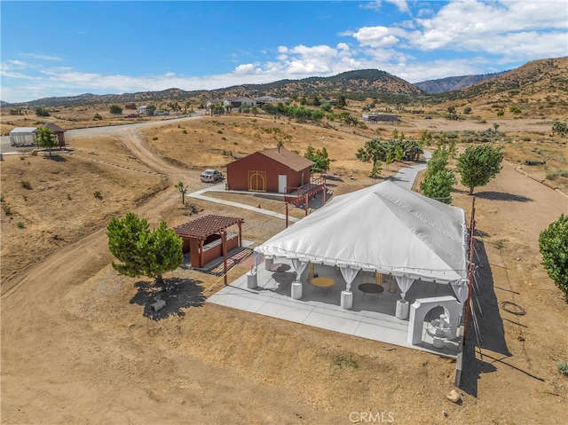 bird's eye view with a mountain view