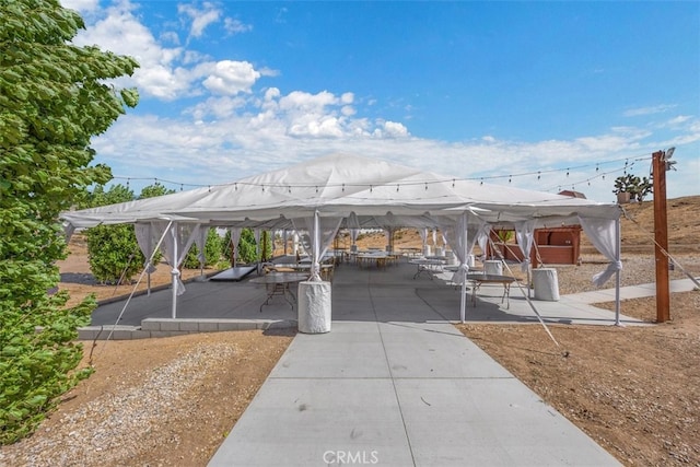 view of property's community featuring a patio