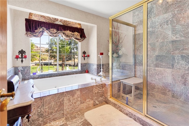 bathroom featuring tiled bath