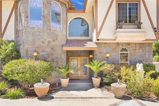 doorway to property featuring french doors