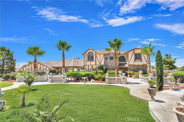 view of front facade with a front lawn