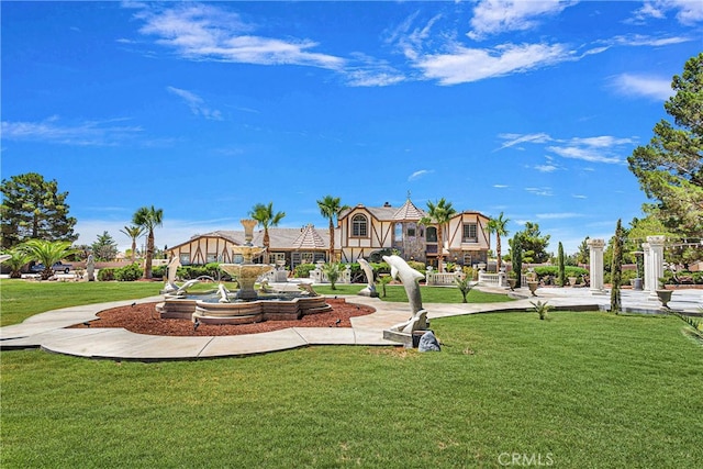 view of community featuring a yard