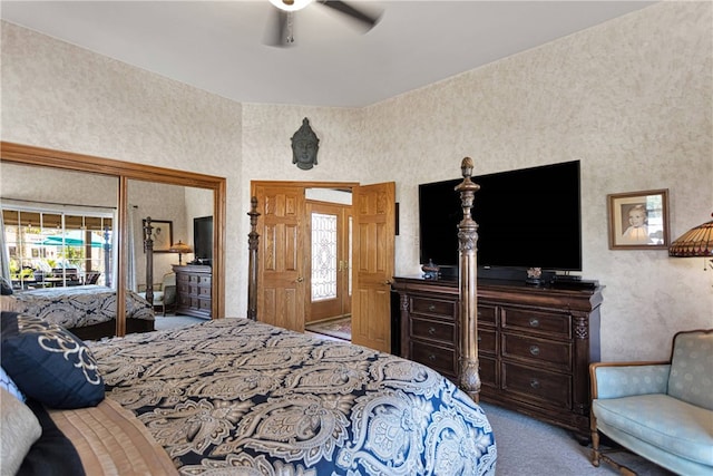 bedroom with ceiling fan and light colored carpet