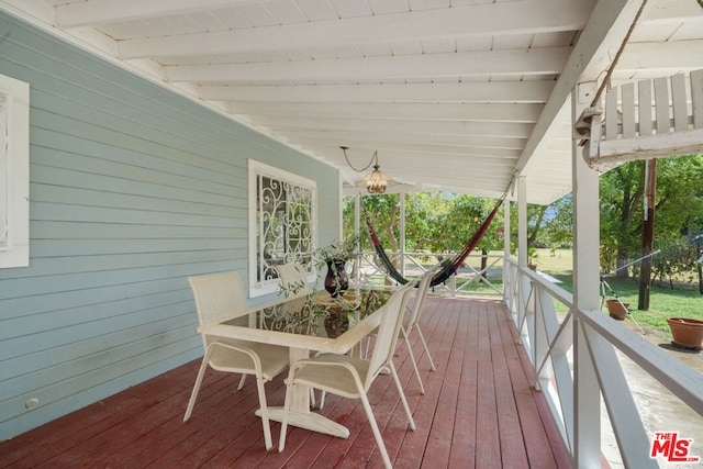 wooden deck featuring covered porch