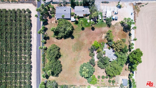 birds eye view of property featuring a rural view