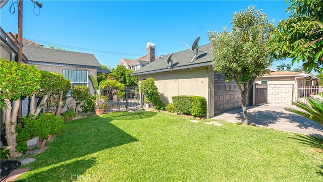 view of yard with a garage