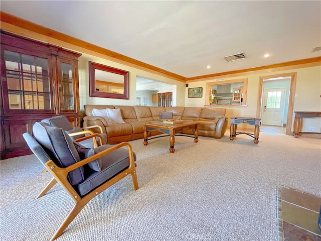 living room with crown molding and carpet flooring