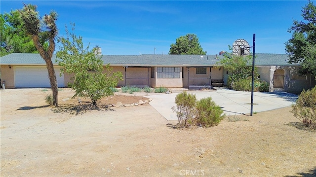 single story home with a garage