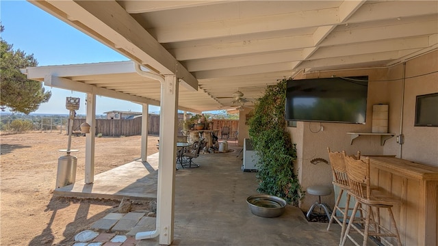 view of patio / terrace featuring exterior bar