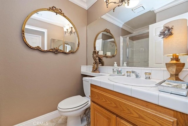 bathroom featuring ornamental molding, vanity, a chandelier, toilet, and a shower with shower door