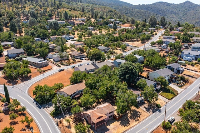 drone / aerial view with a residential view and a mountain view