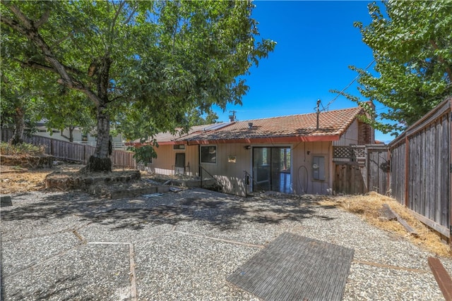 rear view of house featuring a patio area