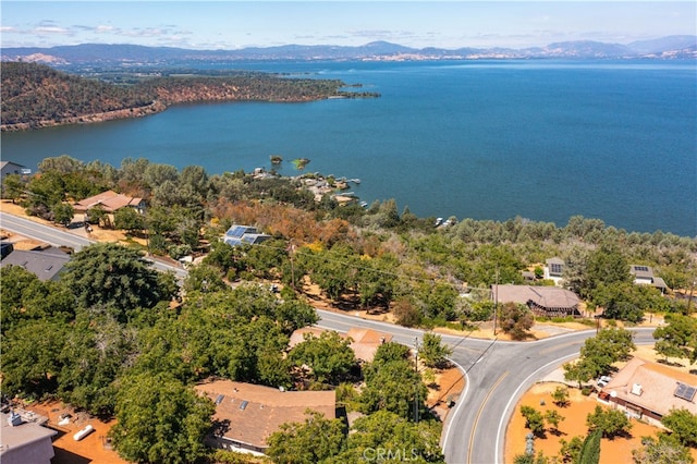 bird's eye view featuring a water and mountain view