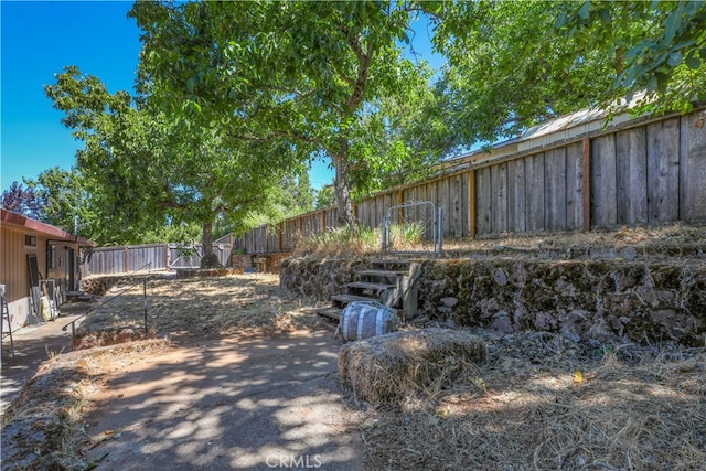 view of yard featuring a fenced backyard