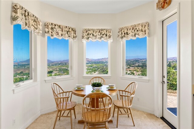 dining room featuring light tile patterned floors