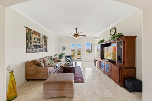 living room with ornamental molding and french doors