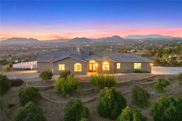 exterior space featuring a mountain view