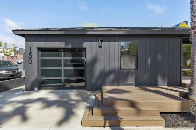 property entrance featuring a wooden deck