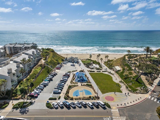 aerial view featuring a water view and a beach view