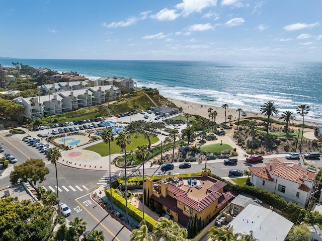 bird's eye view featuring a beach view and a water view