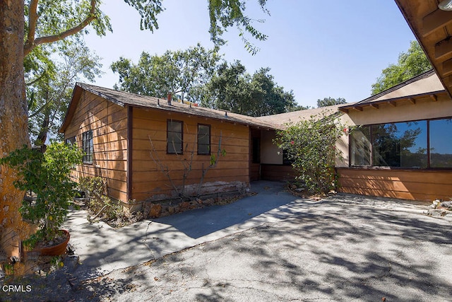 view of home's exterior featuring a patio