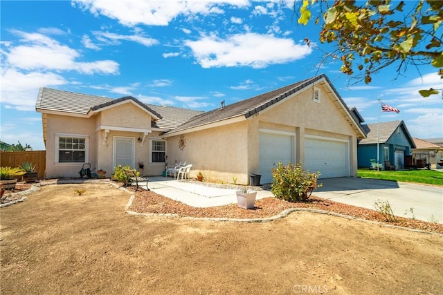 single story home featuring a garage