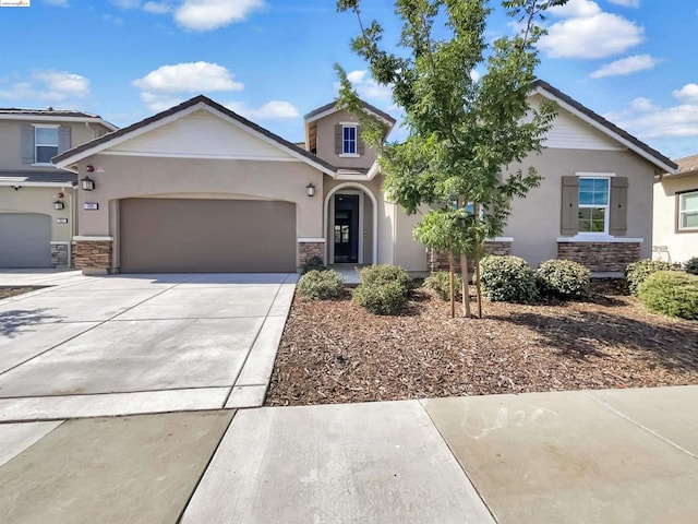 view of front of property with a garage