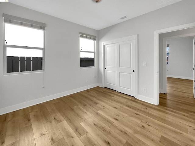 unfurnished bedroom with light hardwood / wood-style flooring