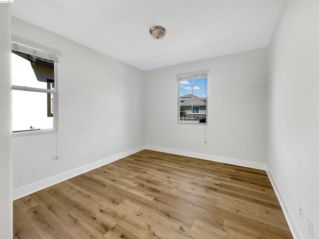 empty room featuring hardwood / wood-style floors