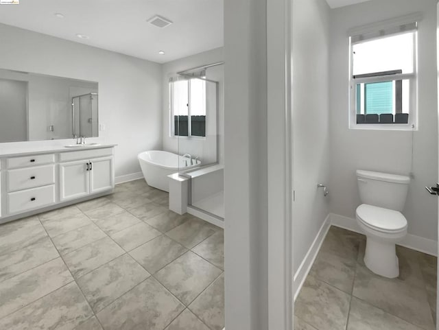 full bathroom with plus walk in shower, vanity, toilet, and a wealth of natural light