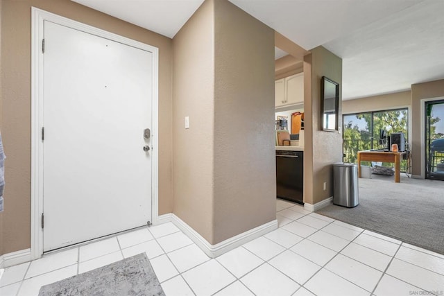 view of tiled foyer entrance