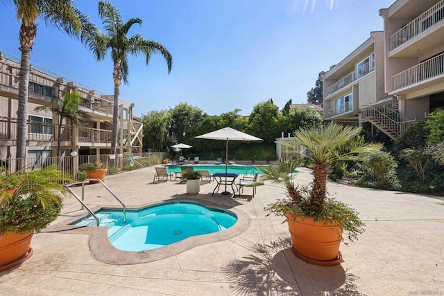 view of pool with a patio area